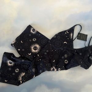 Skatie bodysuit - size small. New. Never worn